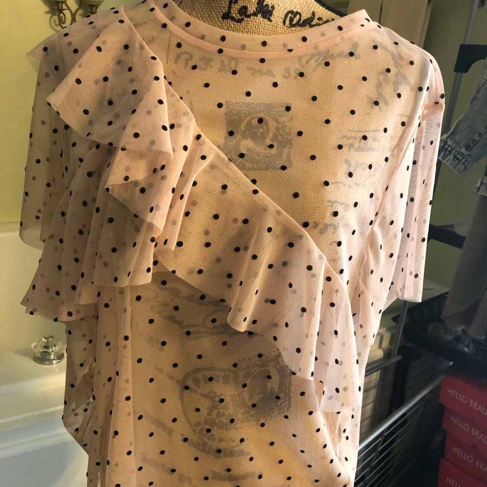 Pink and black polka dot shirt